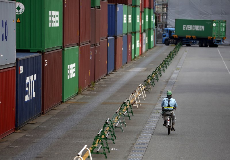 Japan exports tumble most since financial crisis, policymakers meet over yen