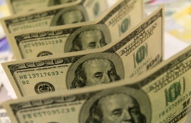 Dollar hits nearly eight-week low against euro day after Fed minutes
