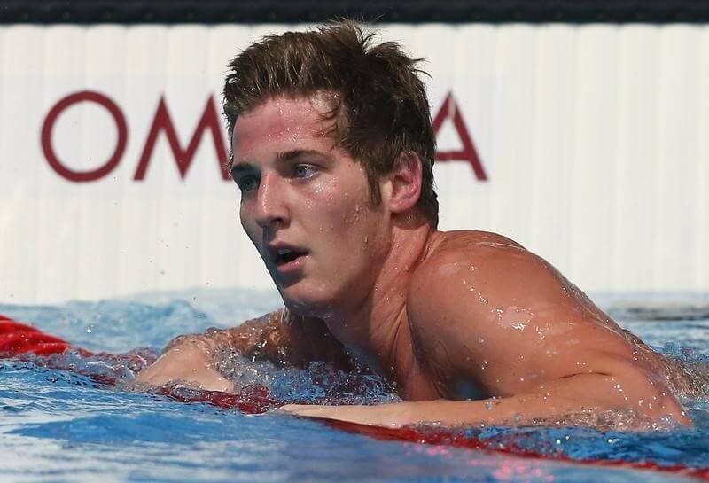 U.S. swimmer Feigen at Rio airport, waiting to leave Brazil : staff