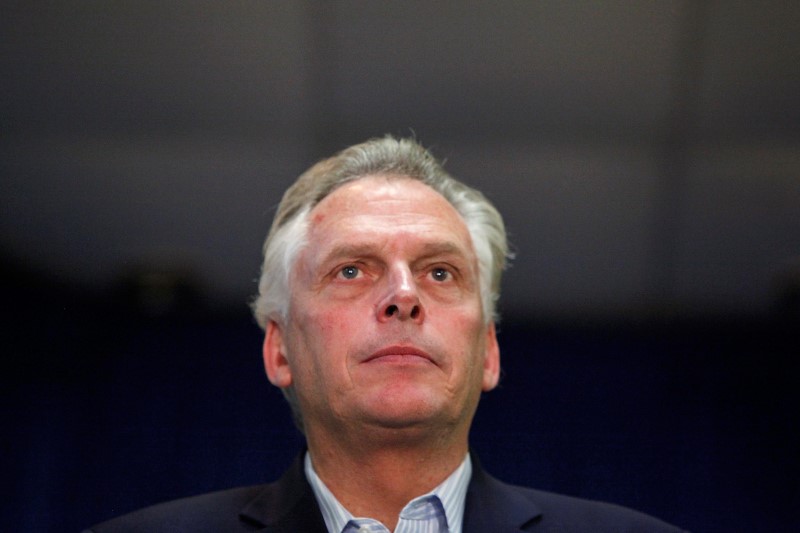 Virginia governor restores voting rights to 13,000 felons