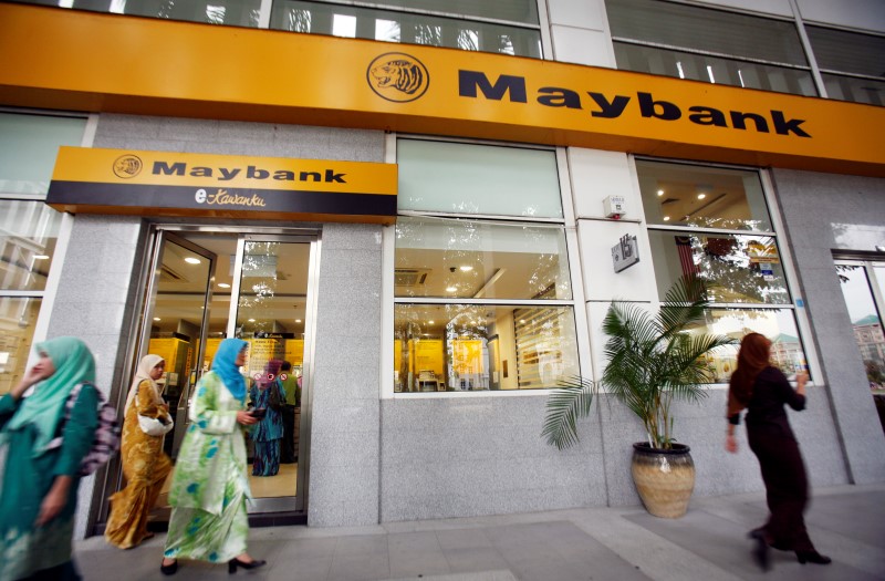 Maybank second quarter profit slides, says closely monitoring oil sector
