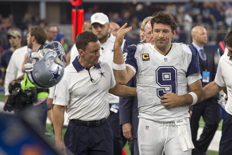 Cowboys quarterback Romo has broken bone in back