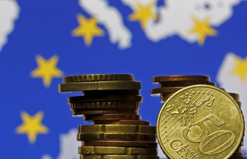 Euro zone monthly economic sentiment falls more than expected