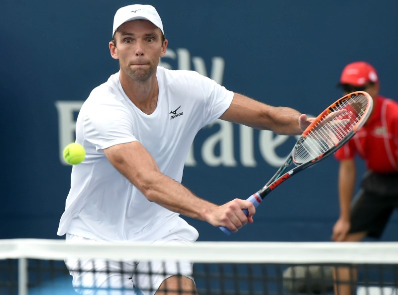 Karlovic sets U.S. Open record with 61 aces in win over Lu