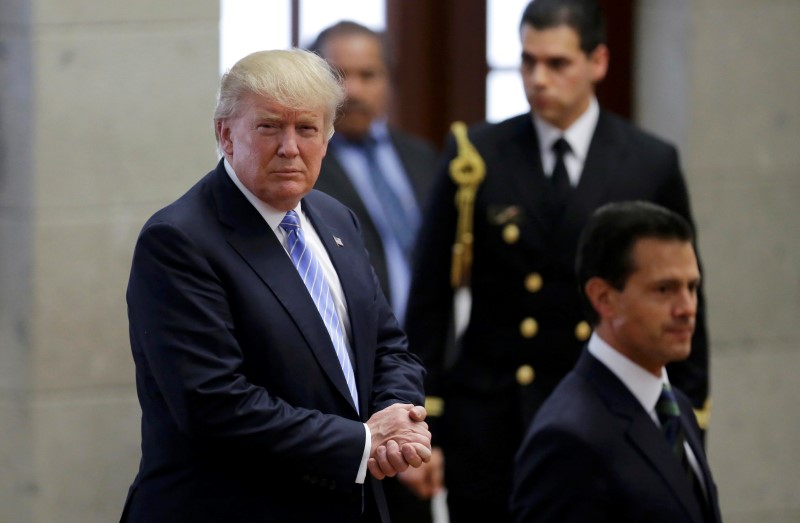 Trump says he, Mexican leader discussed border wall but not who pays