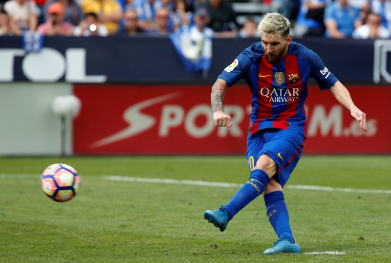 Soccer: Barca must do ‘a little bit more” without Messi