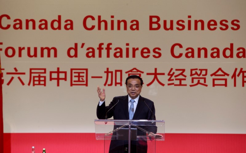 Canada, China sign law enforcement agreements during Li visit