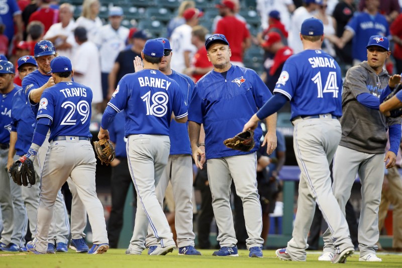 Baseball: Blue Jays rout Rangers in ALDS opener