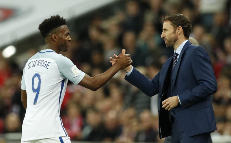 Few smiles as Southgate starts England reign with win