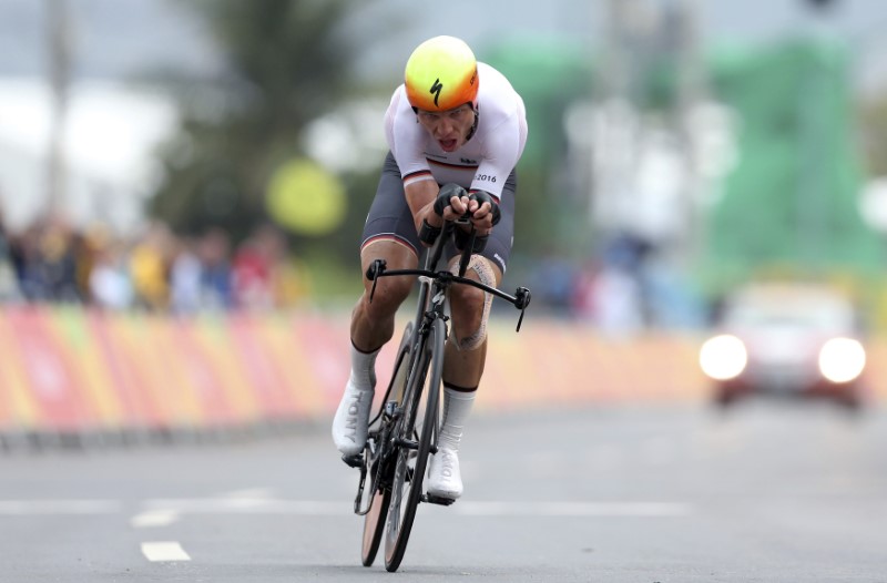 Cycling: Martin matches record with fourth time trial world title