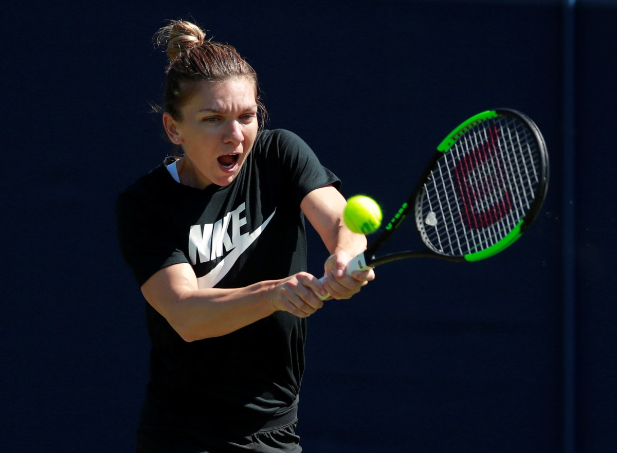 Halep will not play Fed Cup if format changes