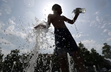 Climate records fall as Europe bakes in heatwave