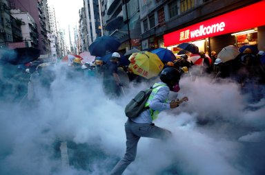 Protesters clash in Hong Kong as cycle of violence intensifies