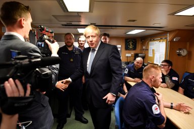 UK plays Brexit hardball with EU from submarine base, pound tumbles