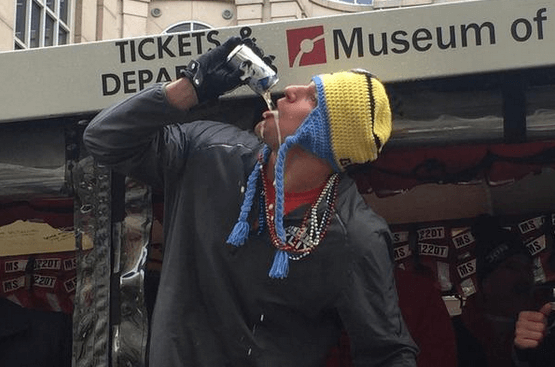 PHOTO: Gronkowski chugs beer, Edelman spikes sweater during Patriots parade