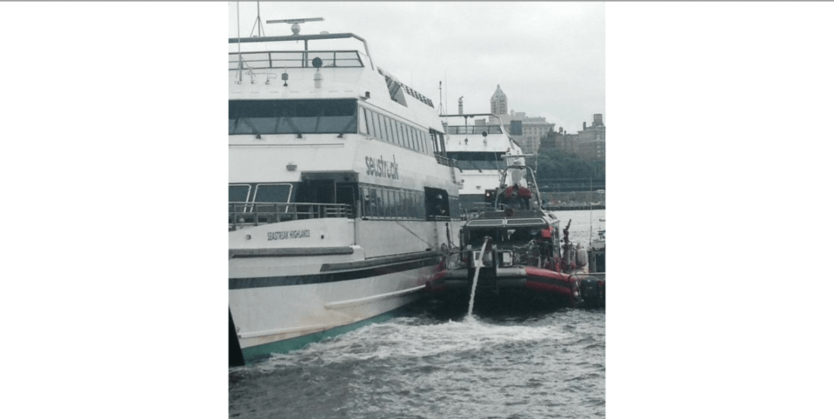 FDNY responds to small boat engine fire off pier 11