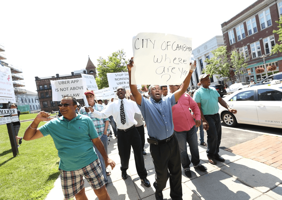 Cambridge cabbies cry foul, push for regulation for Uber, Lyft