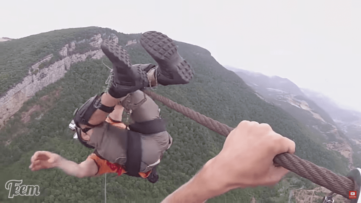 Video of base jump off a zip line will make your hands sweat
