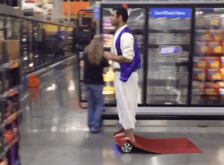 VIDEO: Guy on hoverboard wearing Aladdin costume just won Halloween