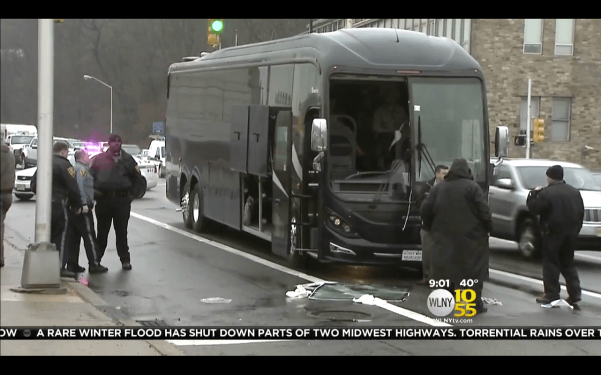 Man ejected through tour bus windshield