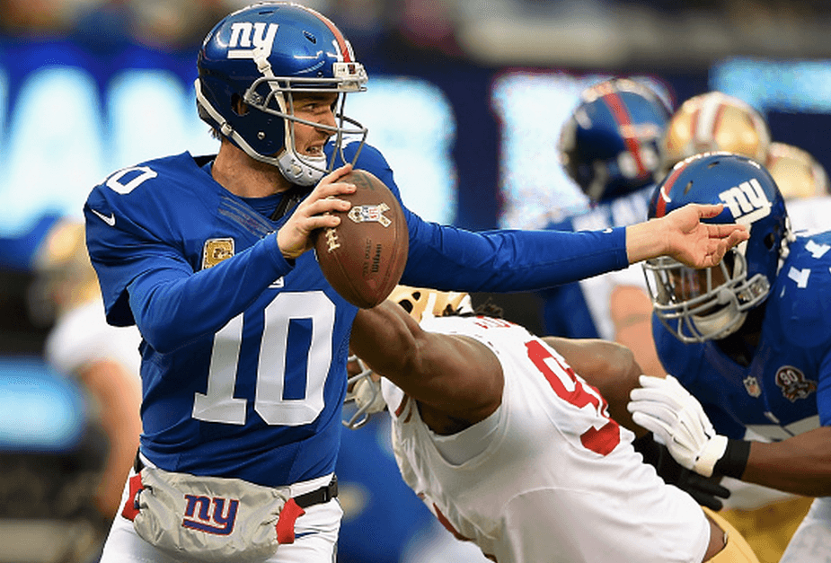 Tom Coughlin defends Eli Manning and his five interceptions