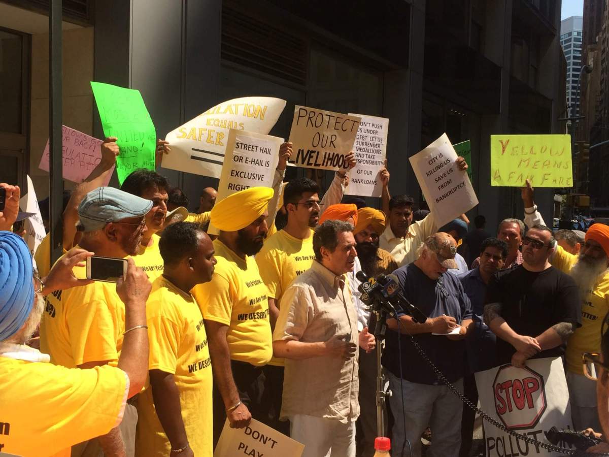 Independent taxi medallion owners protest in front of TLC offices