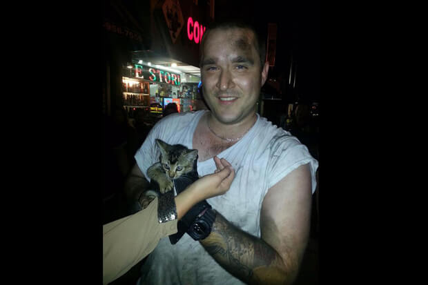NYPD Officer saves cat