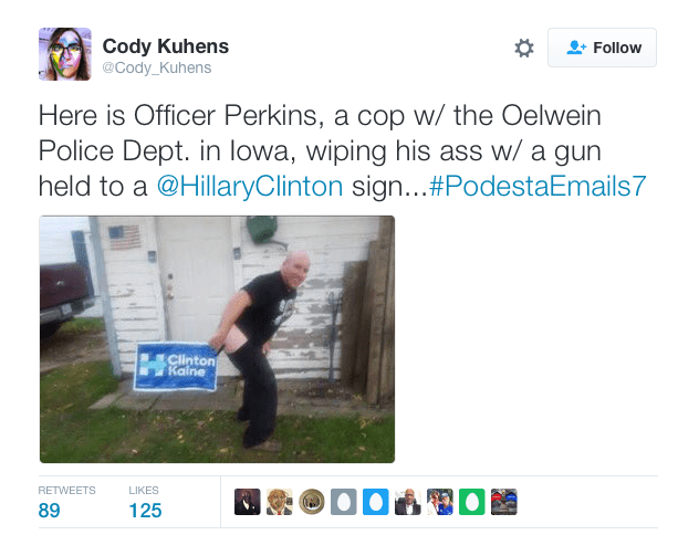 Photo shows off-duty Iowa cop mooning, pointing gun at Clinton-Kaine yard