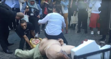 Watch naked Hillary Clinton statue cause chaos during morning commute
