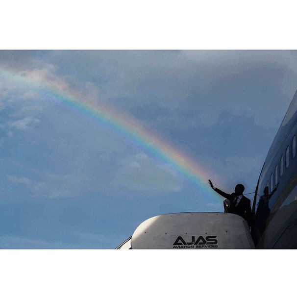 President Obama shoots a rainbow out of his hand