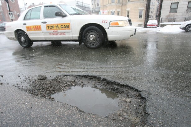 Baker setting up $30m fund for Mass. to fix potholes
