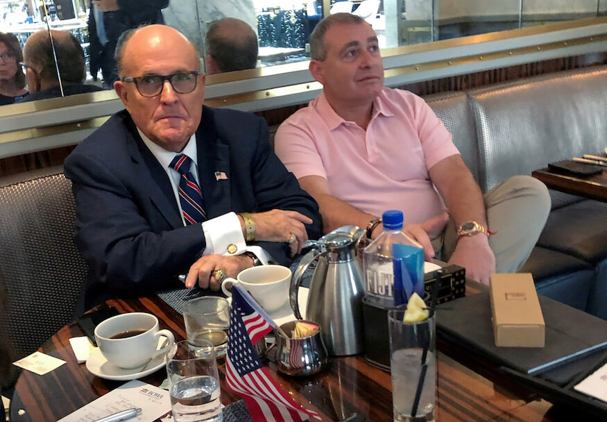 Giuliani associates charged with illegally funneling cash to pro-Trump group