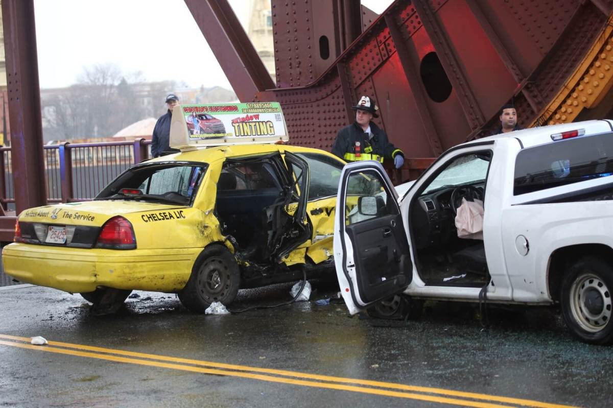 Taxi, pickup truck collide on East Boston bridge