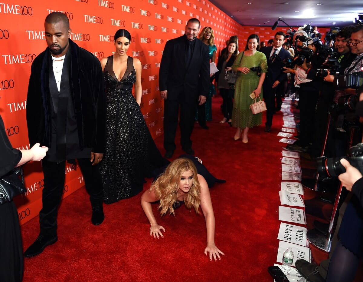 PHOTO: .GIF of Amy Schumer falling in front of Kim and Kanye at Time 100 gala