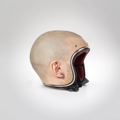 Motorbike helmets are designed to look like shaved human heads