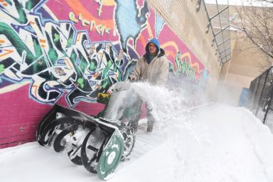 PHOTOS: Winter storm Juno’s “aftermath” means messy clean-up for New Yorkers