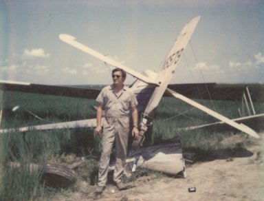 gary-betzner-with-crashed-plane-1200×914-1