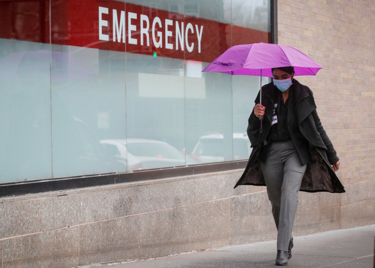 A Healthcare worker arrives at Mount Sinai Hospital, during the