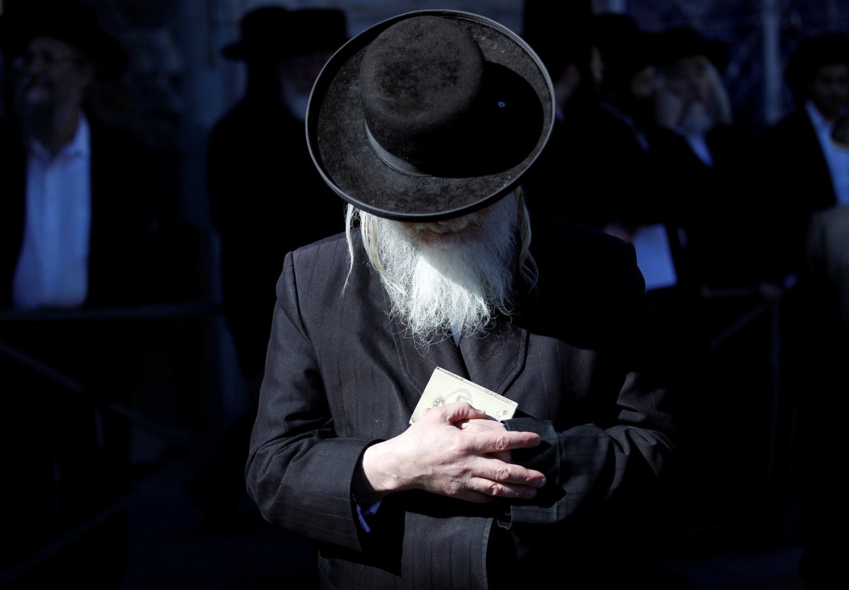 FILE PHOTO: An Ultra-Orthodox Jewish man prays during a protest