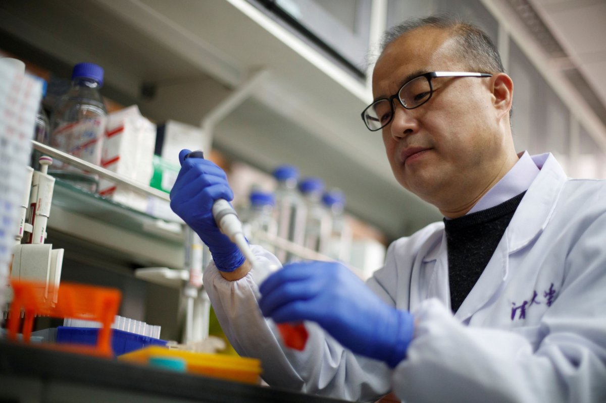FILE PHOTO: Scientist Linqi Zhang in his laboratory at Tsinghua