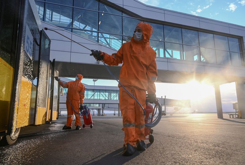Specialists sanitize an airport near Rostov-on-Don