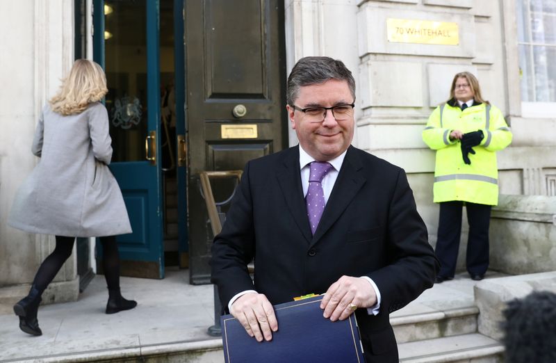Britain’s Justice Secretary Robert Buckland leaves after attending a meeting