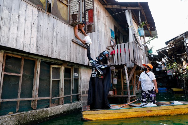 Village officer dressed as Darth Vader delivers relief goods amid