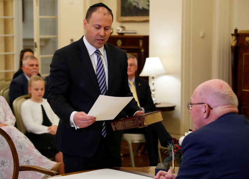 The new Treasurer Josh Frydenberg attends the swearing-in ceremony in