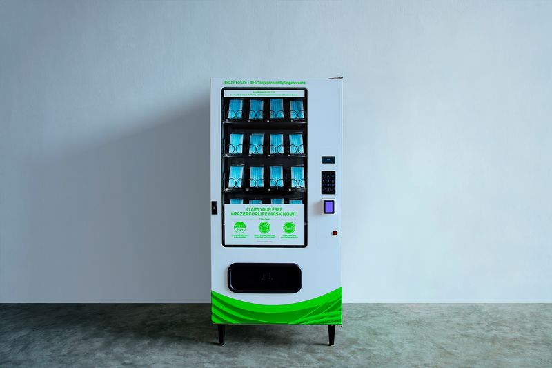 A vending machine that dispenses masks made by Razer is