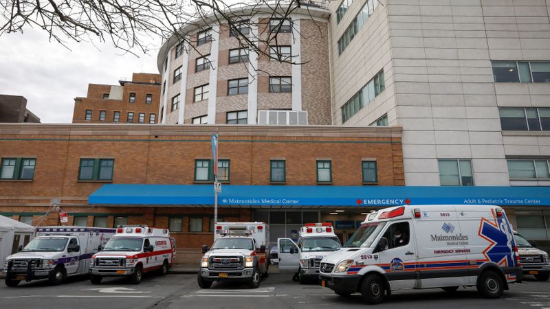 Ambulances are seen outside the emergency center at Maimonides Medical
