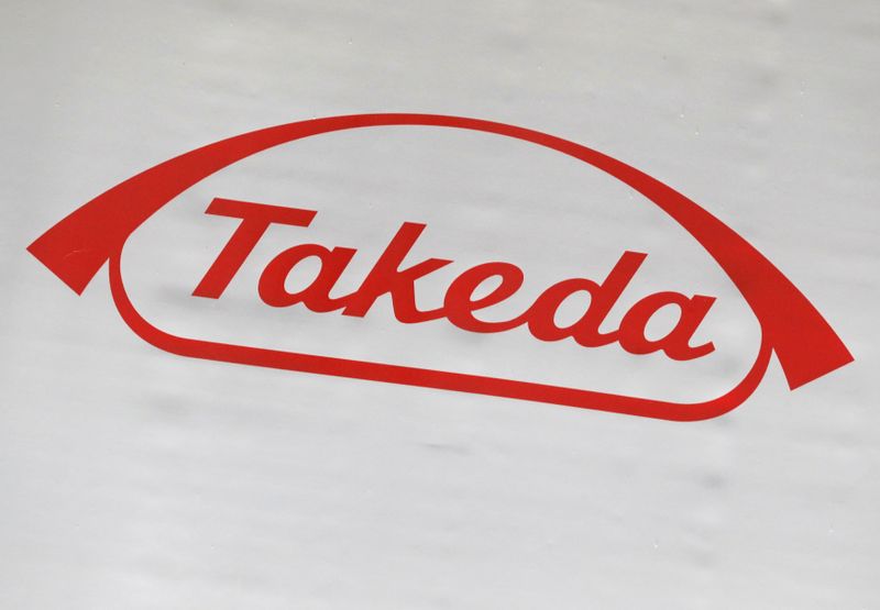 FILE PHOTO: The logo of Takeda Pharmaceutical Co. is displayed