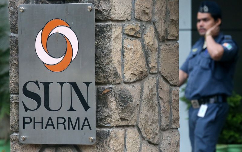 A guard walks inside the office of Sun Pharmaceutical Industries