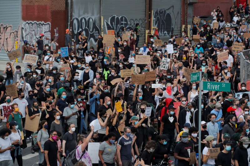 People take part in a Black Lives Matter protest in