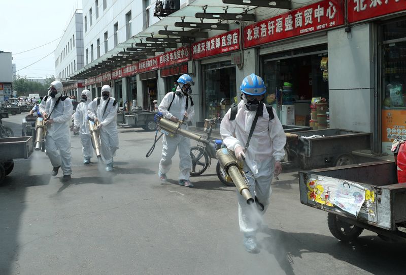 Volunteers from Blue Sky Rescue team disinfect the Yuegezhuang wholesale
